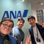 A group photo of Scot, Eito, and Nobuaki at All Nippon Airways.