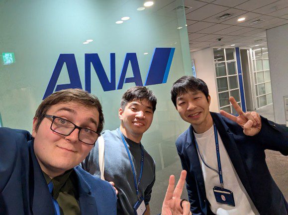 A group photo of Scot, Eito, and Nobuaki at All Nippon Airways.