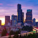 Seattle skyline against a red sunset